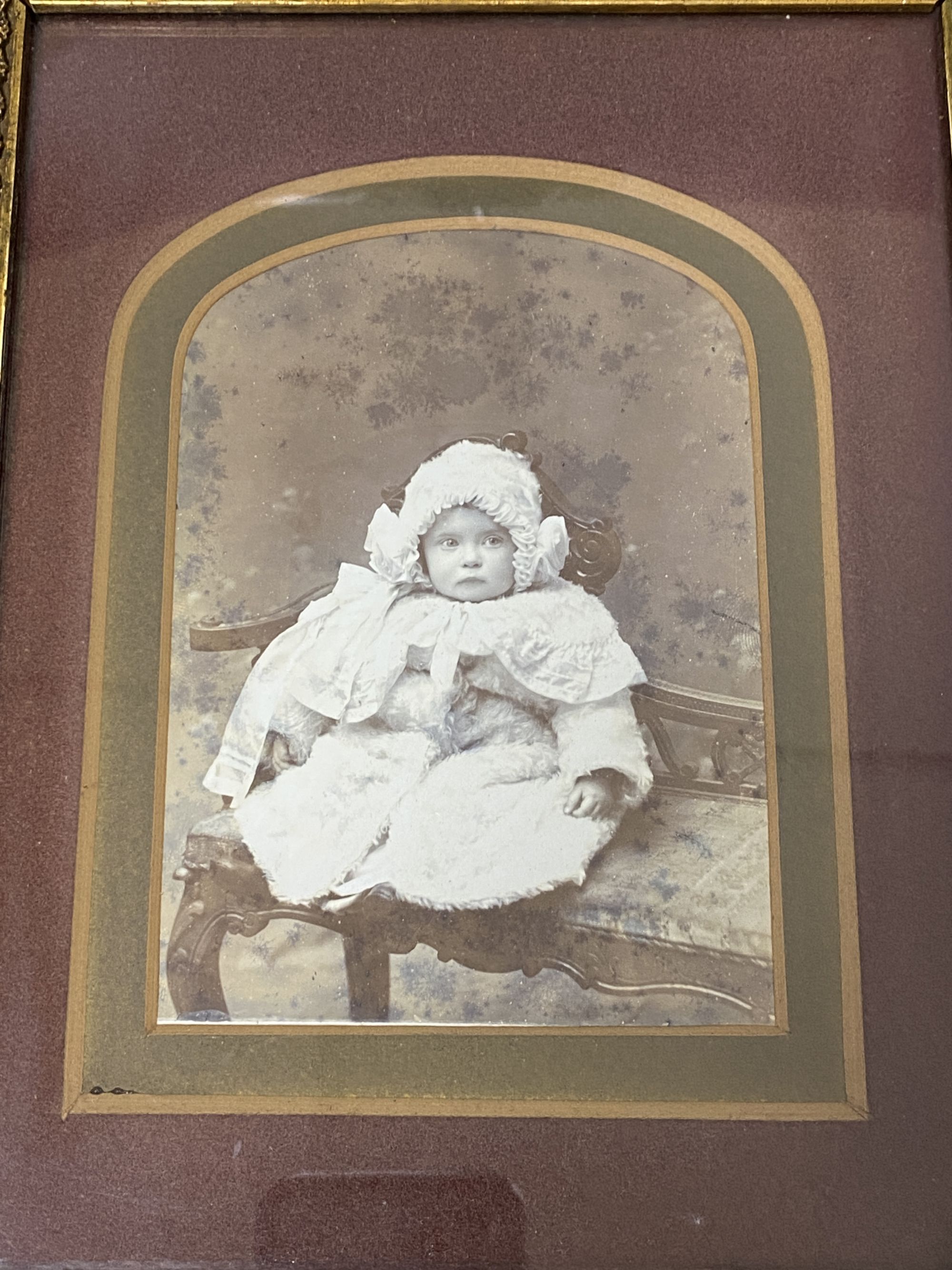 A framed photograph of a girl